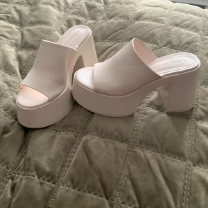 Never worn, brand new platform sandle